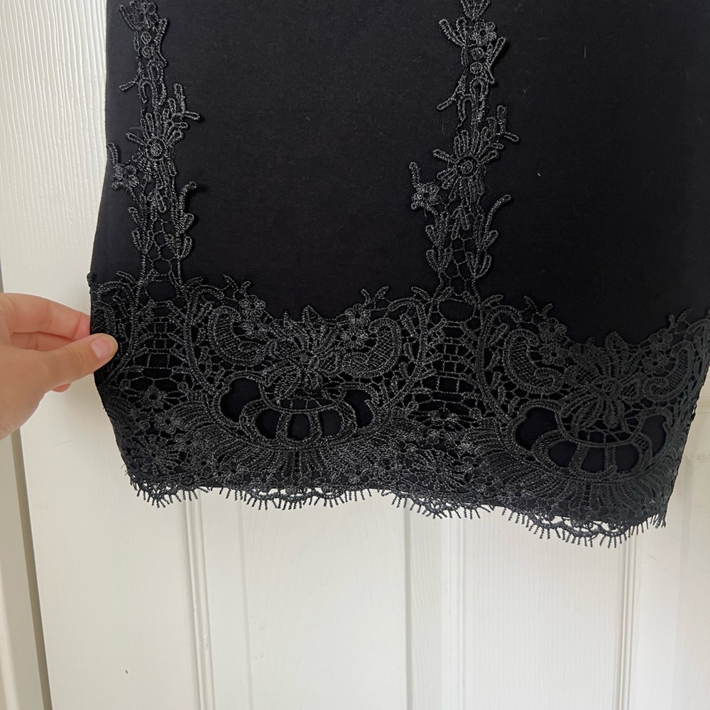 Black strapless body con dress